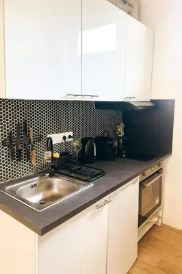 Cuisine ou kitchenette dans l'établissement Studio in Les Halles Center