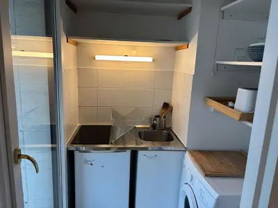 Cuisine ou kitchenette dans l'établissement Le Petit Cocon - Cosy - Terrasse - Centre Ville - 2 personnes