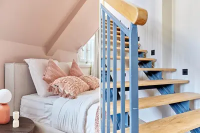 Un ou plusieurs lits dans un hébergement de l'établissement Grand Duplex - Arc de Triomphe