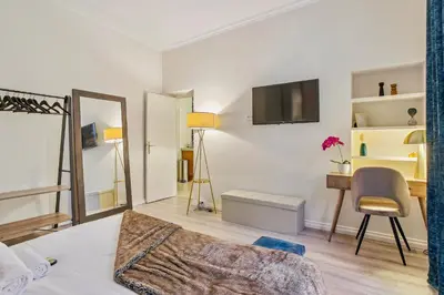 Un ou plusieurs lits dans un hébergement de l'établissement Place des Vosges - Marais - Prime Location
