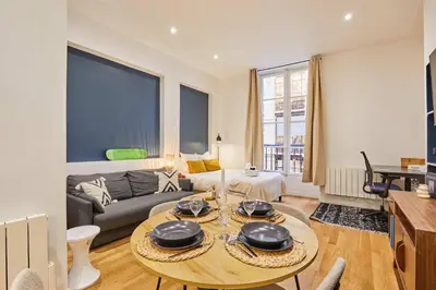 Coin salon dans l'établissement Charming & Modern Studio Center of Paris