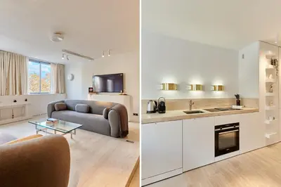 Cuisine ou kitchenette dans l'établissement Sublim apartment Montaigne-Eiffel Tower