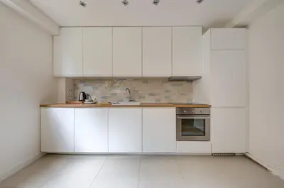 Cuisine ou kitchenette dans l'établissement Superbe appart 10 personnes 5min La Défense