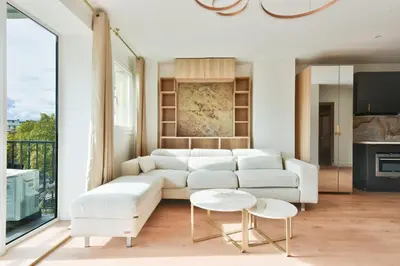 Coin salon dans l'établissement Bel appartement avec clim - Neuilly-sur-Seine
