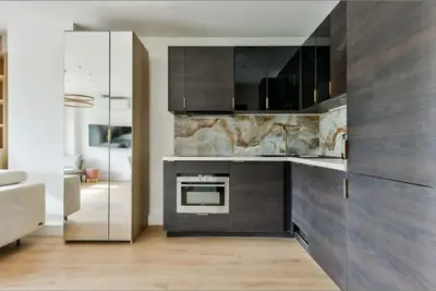 Cuisine ou kitchenette dans l'établissement Bel appartement avec clim - Neuilly-sur-Seine