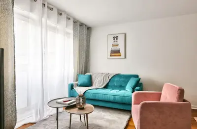Coin salon dans l'établissement Bel appartement au coeur du 8eme arrondissement