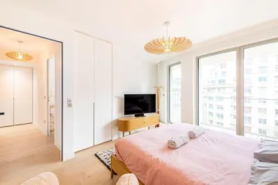 Un ou plusieurs lits dans un hébergement de l'établissement Superbe Duplex neuf - Paris 16