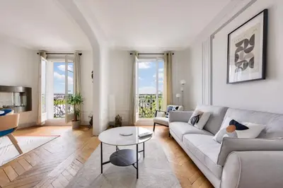 Coin salon dans l'établissement Roland Garros Bel appartement au coeur du 16