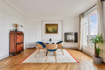 Coin salon dans l'établissement Roland Garros Bel appartement au coeur du 16