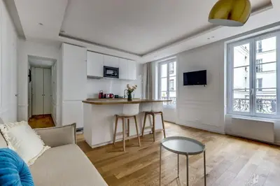 Télévision ou salle de divertissement dans l'établissement Bel appartement au coeur de Paris