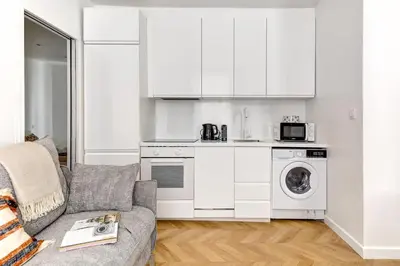 Cuisine ou kitchenette dans l'établissement BnBNova - 1BR - Eiffel Tower & Champ de Mars