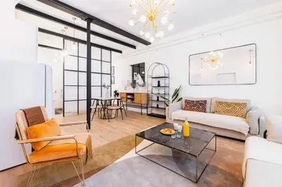 Coin salon dans l'établissement Confortable appartement equipe Sacre coeur - 4P