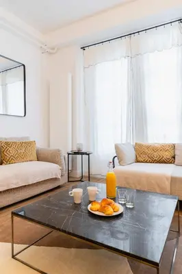 Coin salon dans l'établissement Confortable appartement equipe Sacre coeur - 4P