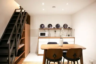 Cuisine ou kitchenette dans l'établissement Cosy Appartement Studio Moderne Mezzanine - 4P