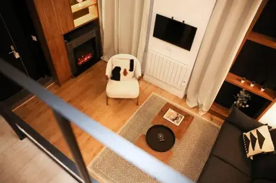 Télévision ou salle de divertissement dans l'établissement Cosy Appartement Studio Moderne Mezzanine - 4P