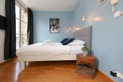 Un ou plusieurs lits dans un hébergement de l'établissement 405 - sejour romantique dans un studio de Paris 5