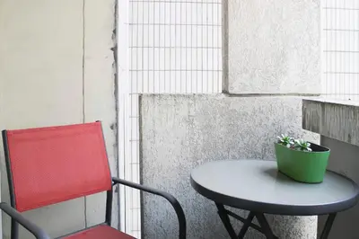 Coin salon dans l'établissement Bright apartment near Nation ideal stay