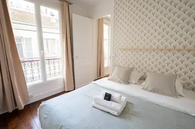 Un ou plusieurs lits dans un hébergement de l'établissement Appartement voltaire refait a neuf - 2P paris 11
