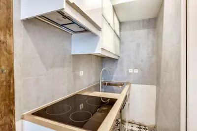 Cuisine ou kitchenette dans l'établissement Appartement Cosy Rue de la Chaussee d'Antin - 4P