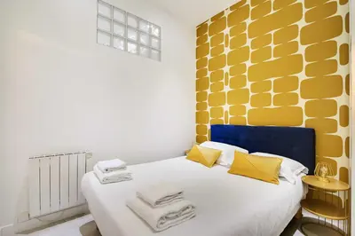 Un ou plusieurs lits dans un hébergement de l'établissement Appartement familial cosy a Paris 3 Proche Marais