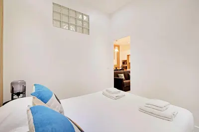 Un ou plusieurs lits dans un hébergement de l'établissement Appartement familial cosy a Paris 3 Proche Marais