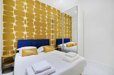 Un ou plusieurs lits dans un hébergement de l'établissement Appartement familial cosy a Paris 3 Proche Marais