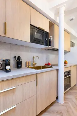 Cuisine ou kitchenette dans l'établissement Sublime 3 chambres a Montmartre avec Clim et Jacuzzi