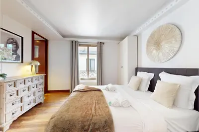 Un ou plusieurs lits dans un hébergement de l'établissement Avenue Montaigne - Prime Location