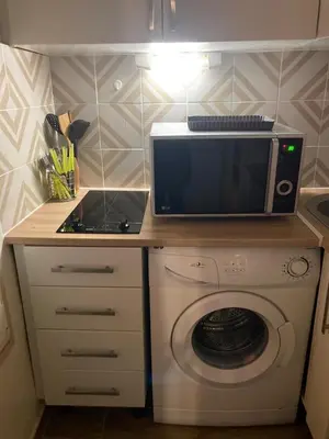Cuisine ou kitchenette dans l'établissement Montparnasse