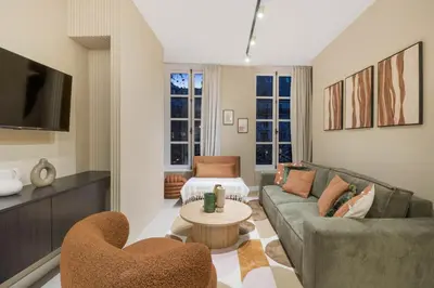Coin salon dans l'établissement Elegant 3-room air-conditioned apartment in the heart of Le Marais