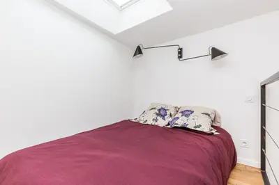 Un ou plusieurs lits dans un hébergement de l'établissement Le Loft du Marais - Building renovation complete