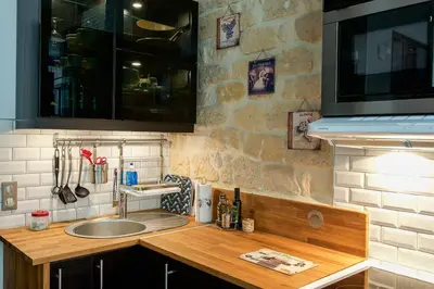 Cuisine ou kitchenette dans l'établissement Cosy Flat Paris between Opéra & Montmartre