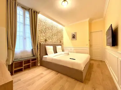 Un ou plusieurs lits dans un hébergement de l'établissement Apartment 4* - 85 sqm - Grenelle - 8p