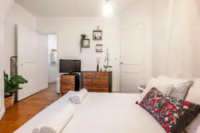 Un ou plusieurs lits dans un hébergement de l'établissement Central Paris Studio - 10 min to Notre-Dame