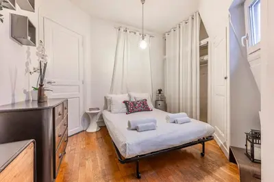Un ou plusieurs lits dans un hébergement de l'établissement Central Paris Studio - 10 min to Notre-Dame