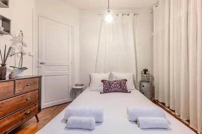 Un ou plusieurs lits dans un hébergement de l'établissement Central Paris Studio - 10 min to Notre-Dame
