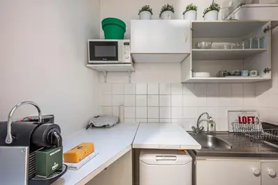 Cuisine ou kitchenette dans l'établissement Central Paris Studio - 10 min to Notre-Dame