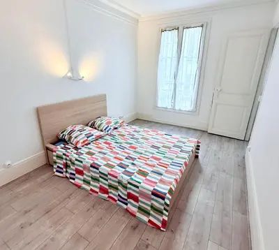 Un ou plusieurs lits dans un hébergement de l'établissement Paris Saint Germain-des-Prés Élégant Deux pièces tout équipé