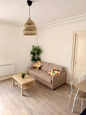 Coin salon dans l'établissement Paris Saint Germain-des-Prés Élégant Deux pièces tout équipé