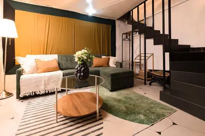 Coin salon dans l'établissement Souplex Design & Spacieux 7 pers Montmartre
