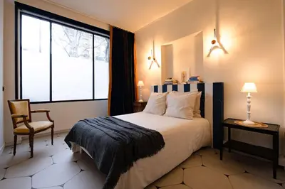 Un ou plusieurs lits dans un hébergement de l'établissement Souplex Design & Spacieux 7 pers Montmartre