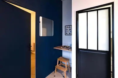 Cuisine ou kitchenette dans l'établissement Souplex Design & Spacieux 7 pers Montmartre