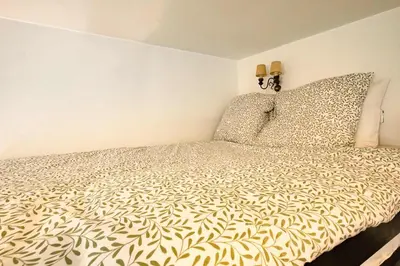 Un ou plusieurs lits dans un hébergement de l'établissement Studio design Pigalle Montmartre