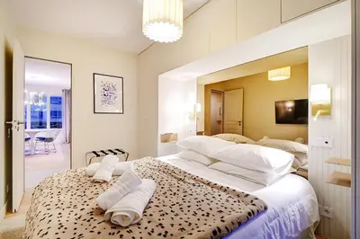 Un ou plusieurs lits dans un hébergement de l'établissement Chic Loft