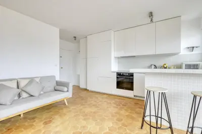 Cuisine ou kitchenette dans l'établissement Le Dormoy - Balcon et vue panoramique sur les toits de Paris