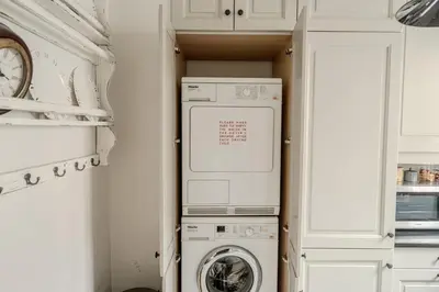 Cuisine ou kitchenette dans l'établissement AC 3bds Apt with arc de triomphe view & terrace