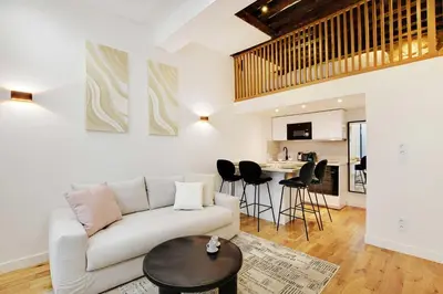 Coin salon dans l'établissement Magnificent apartment - 1BR 4P - Arts et Métiers