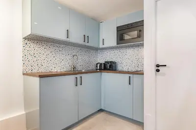 Cuisine ou kitchenette dans l'établissement Bright AC Room Apartment in Marais Bastille