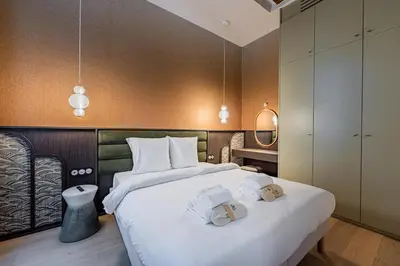 Un ou plusieurs lits dans un hébergement de l'établissement New suite 6 people - Saint Germain Notre-Dame#AC