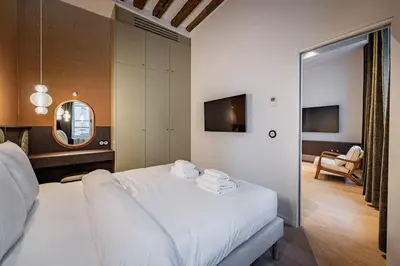 Un ou plusieurs lits dans un hébergement de l'établissement New suite 6 people - Saint Germain Notre-Dame#AC